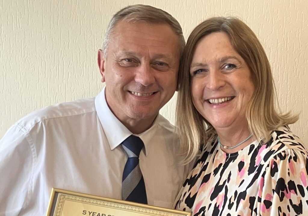 Ruth Meadows, Divisional Operations Manager, presents a Five Year Long Service Award to Martin Griffiths, Funeral Manager for Chester and Crewe, recognising his dedication and contribution to Funeral Partners.